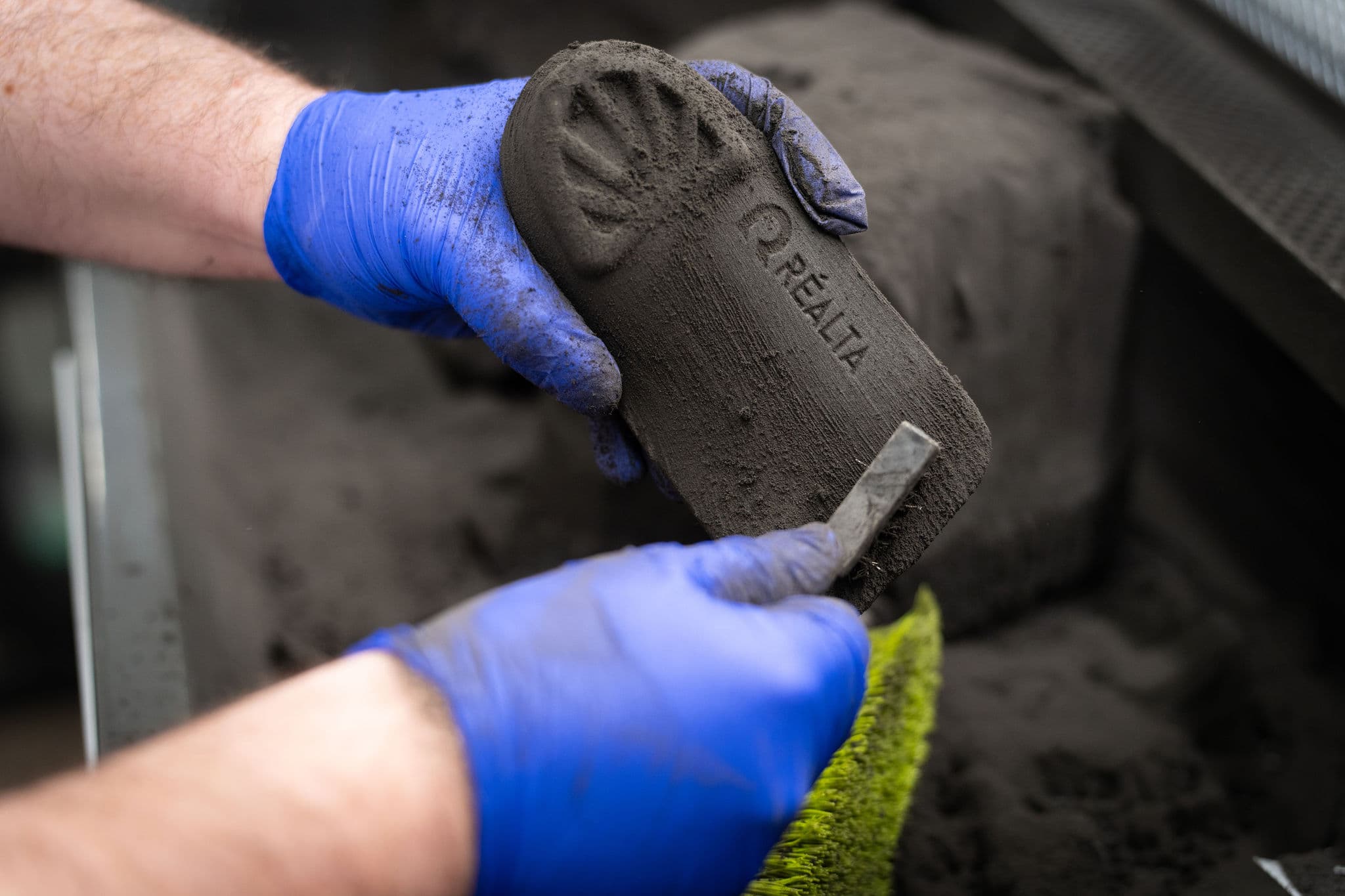 Brushing PA11 nylon powder off a freshly printed orthotic shell
